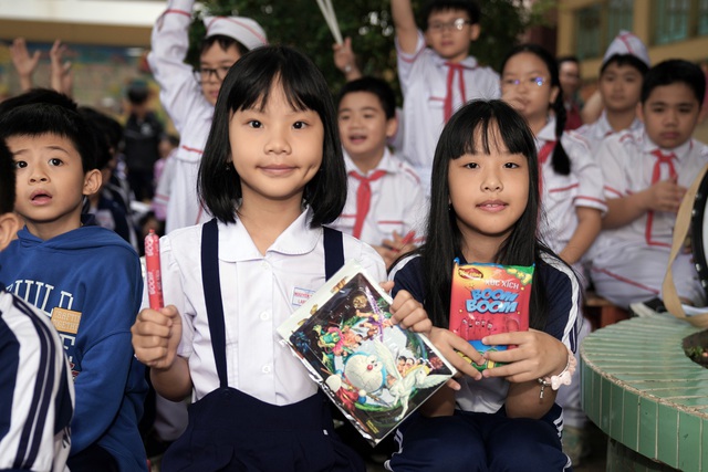 Học trò Trường tiểu học Nguyễn Thượng Hiền thích thú tìm hiểu nhóm chất dinh dưỡng - Ảnh 1.