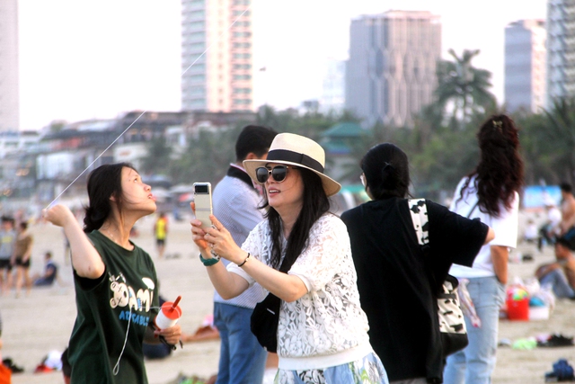 Foreign long-stay visitors seen as ‘clean’ FDI for Da Nang: experts- Ảnh 4.