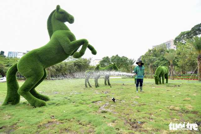 Long-abandoned land in downtown Ho Chi Minh City transformed into flower-filled park
- Ảnh 5.