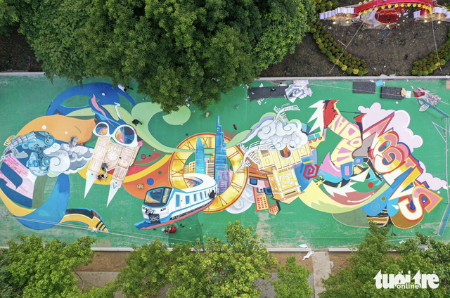 Long-abandoned land in downtown Ho Chi Minh City transformed into flower-filled park
- Ảnh 6.