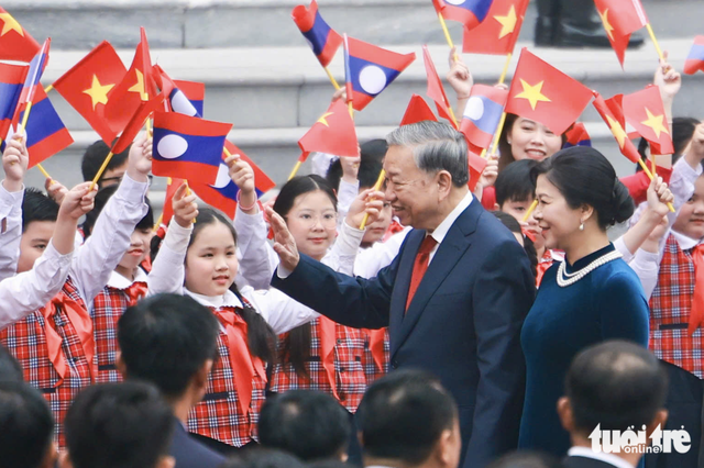 Vietnam’s Party chief To Lam chairs welcome ceremony for top Lao leader
- Ảnh 3.