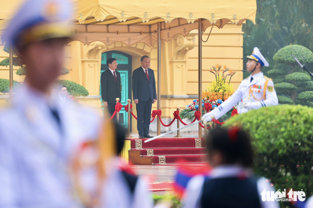Vietnam’s Party chief To Lam chairs welcome ceremony for top Lao leader
- Ảnh 7.