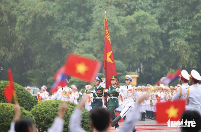 Vietnam’s Party chief To Lam chairs welcome ceremony for top Lao leader
- Ảnh 8.