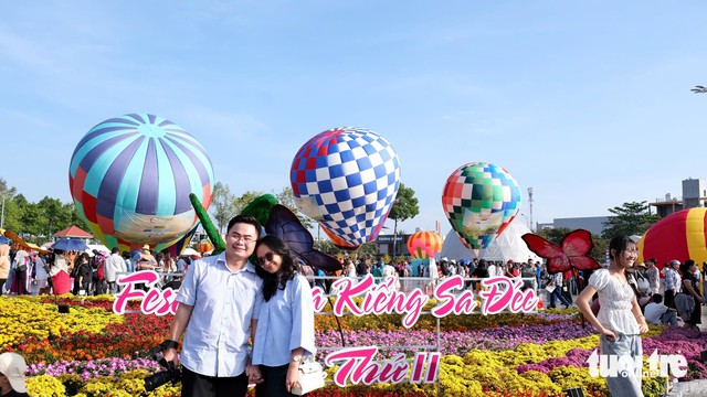 In southern Vietnam, flower festival draws nearly 1.2 million visitors in nine days- Ảnh 3.