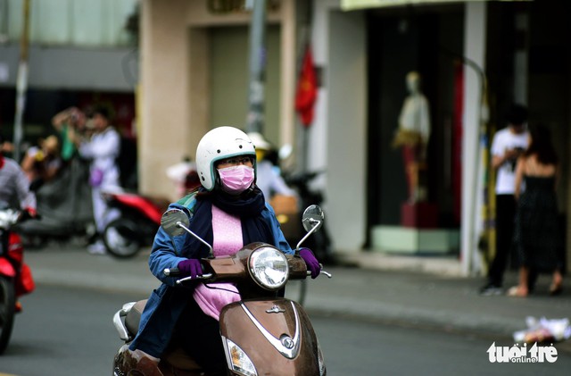 Ho Chi Minh City wakes up to 20°C today, colder day ahead - Ảnh 1.