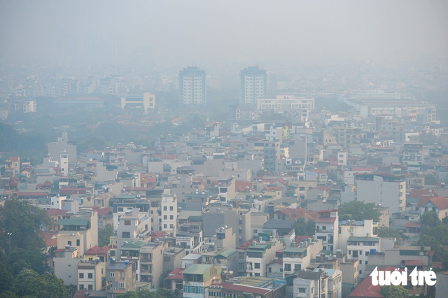 Hanoi air pollution reaches unhealthy level  - Ảnh 3.