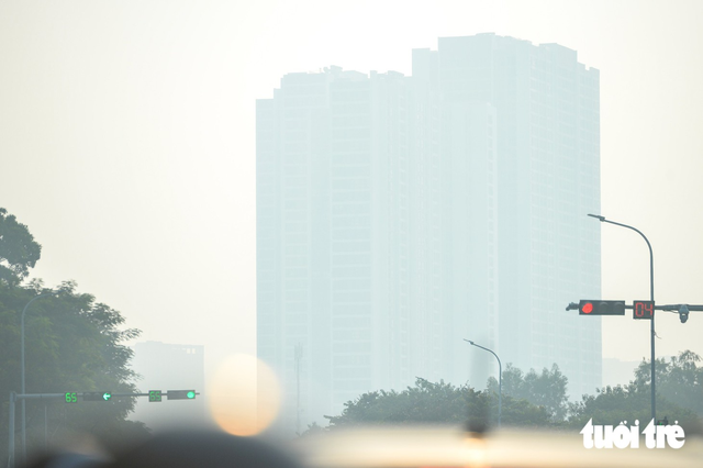 Hanoi air pollution reaches unhealthy level  - Ảnh 4.