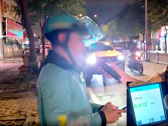 Ho Chi Minh City police catch ride-hailing drivers drunk driving- Ảnh 1.