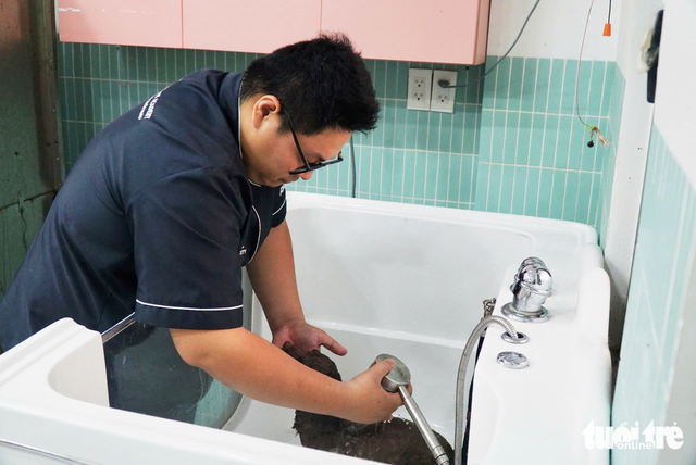 Young Vietnamese pet owners rush to grooming, boarding services ahead of Tet- Ảnh 1.