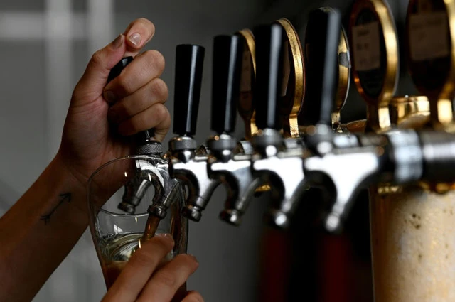 Undercover probe finds Australian pubs short-pouring beer- Ảnh 1.