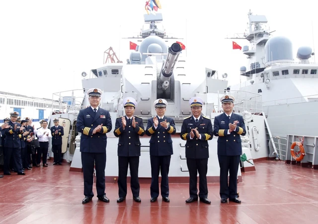 Vietnam, China navies hold 1st live-fire drill - Ảnh 1.