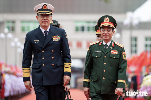 Vietnam’s General Phan Van Giang chairs welcome ceremony for Chinese defense minister - Ảnh 4.