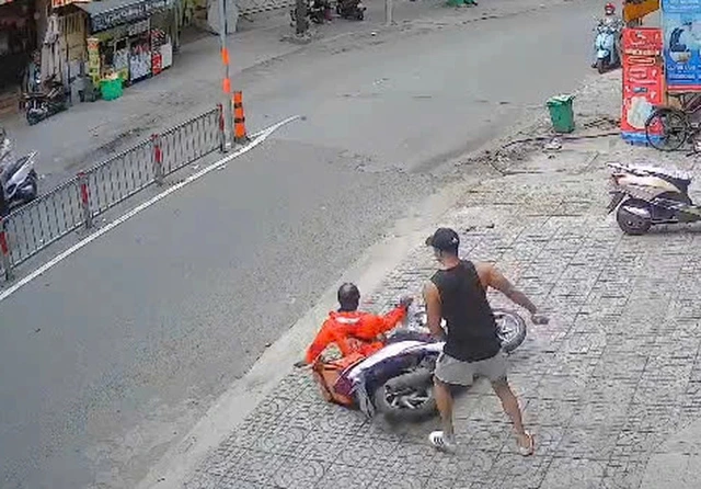 Ho Chi Minh City police arrest man for assaulting female shipper - Ảnh 1.