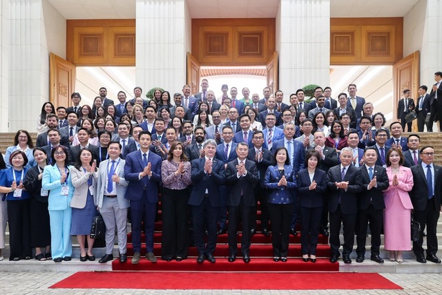 Vietnam PM pledges support for US firms, calls for more investment in energy, telecoms- Ảnh 1.