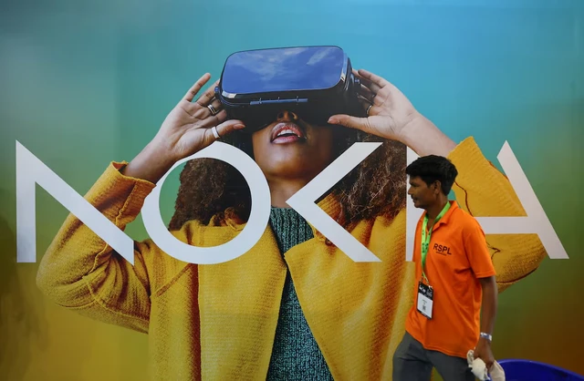 AI boom lifts Nokia sales, shares hit 16-year high after earnings beat- Ảnh 1.