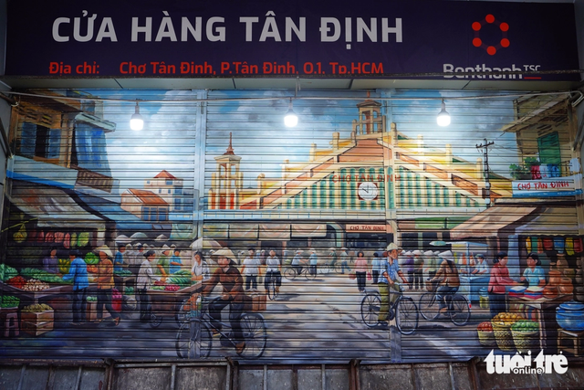 100-year-old Tan Dinh Market in Ho Chi Minh City gets new look with mural paintings- Ảnh 4.