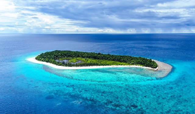 Vietnamese traveler explores world’s second-largest island in search of remote adventures- Ảnh 1.