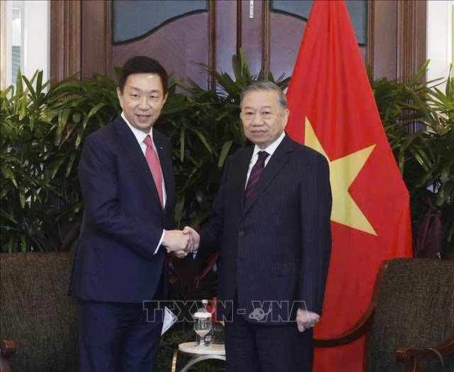 Vietnam’s Party chief meets senior executives of Singapore corporations - Ảnh 4.