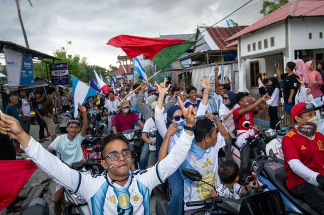 Indonesian Messi superfan welcomes World Cup- Ảnh 2.