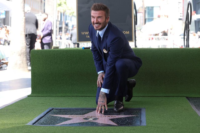 David Beckham honored with Walk of Fame star as LA hosts World Cup games- Ảnh 1.