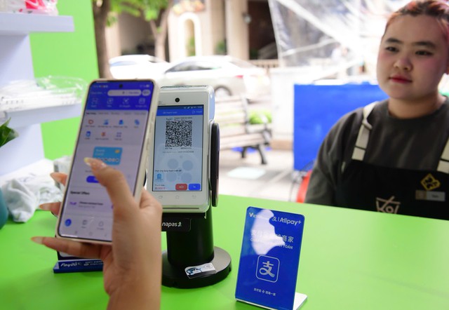 Napas đẩy mạnh thanh toán xuyên biên giới qua mã QR - Ảnh 2.