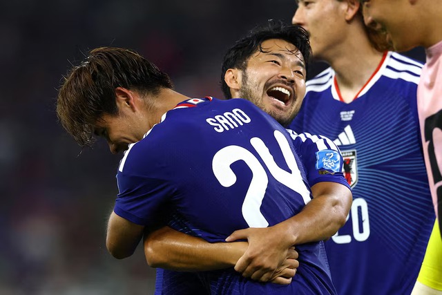 Japan rout Tunisia 4-0 as Ueda shines in World Cup's 1,000th match- Ảnh 7. Japan rout Tunisia 4-0 as Ueda shines in World Cup's 1,000th match- Ảnh 7.
