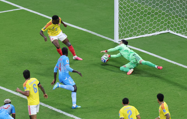 Munoz strike sends Colombia into World Cup Round of 32 - Ảnh 1.