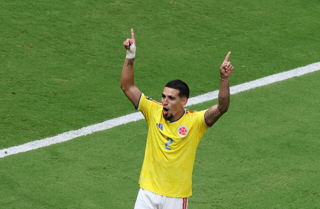 Munoz strike sends Colombia into World Cup Round of 32 - Ảnh 2.
