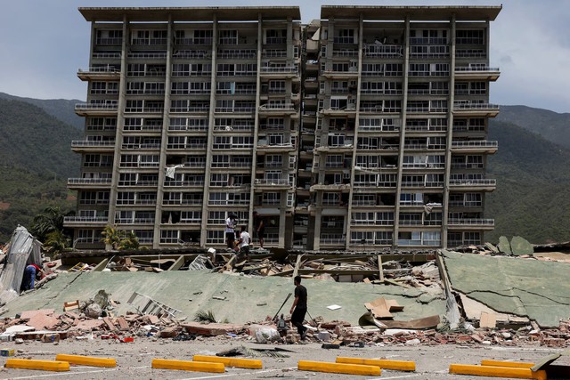 Venezuela quake toll tops 900, search intensifies for hundreds trapped- Ảnh 7.