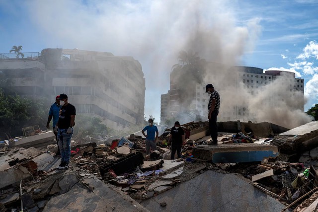 Venezuela quake death toll nears 1,500 as rescue work goes on- Ảnh 1.