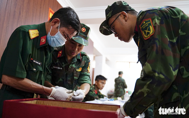 Search for war martyrs’ remains continues at Ho Chi Minh City park - Ảnh 1.