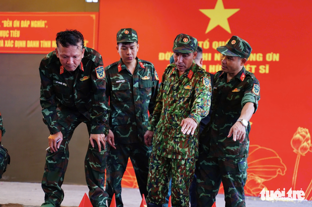 Search for war martyrs’ remains continues at Ho Chi Minh City park - Ảnh 3.