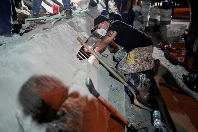 Colombia quake death toll tops 250 as rescuers race to find survivors - Ảnh 3.