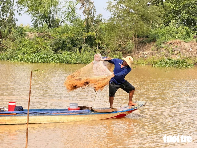 Explainer: Why do Vietnam’s Mekong Delta residents look forward to a timely flood season?- Ảnh 2.