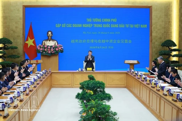 PM urges Chinese firms to increase investment with higher quality, advanced technologies- Ảnh 1.