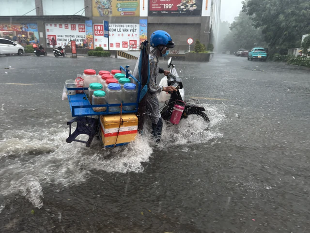 Southern Vietnam braces for 3 days of heavy rain- Ảnh 1.