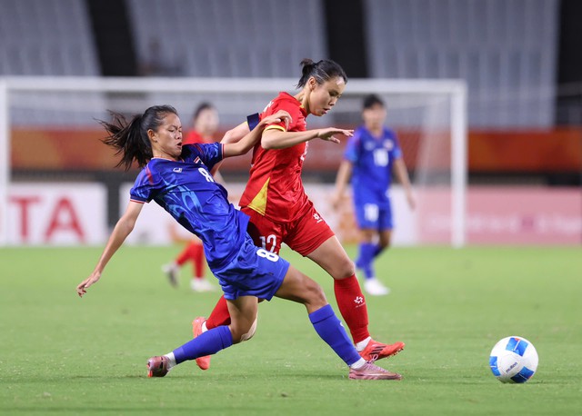 Vietnam women's football team reach Asian Games quarterfinals after 0-0 draw with Thailand - Ảnh 1.