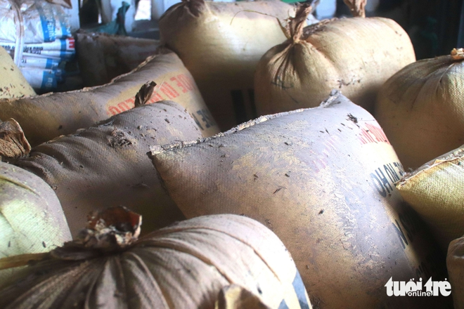 Rice traders in Da Nang struggle after last week’s floods as new heavy rains hit- Ảnh 9.