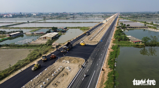 Work accelerates on Hanoi’s 41km southern axis road  - Ảnh 4.