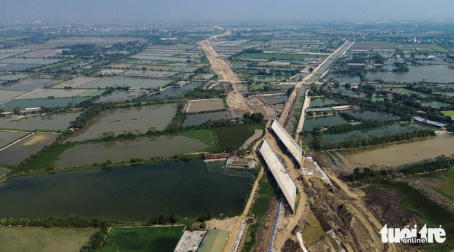 Work accelerates on Hanoi’s 41km southern axis road  - Ảnh 6.