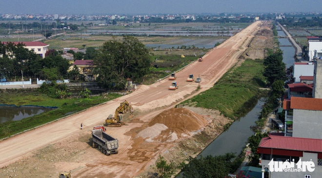 Work accelerates on Hanoi’s 41km southern axis road  - Ảnh 8.