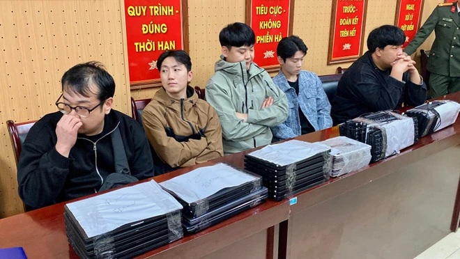Vietnam police bust Hanoi-based phone scam ring targeting S.Koreans in S.Korea- Ảnh 4.