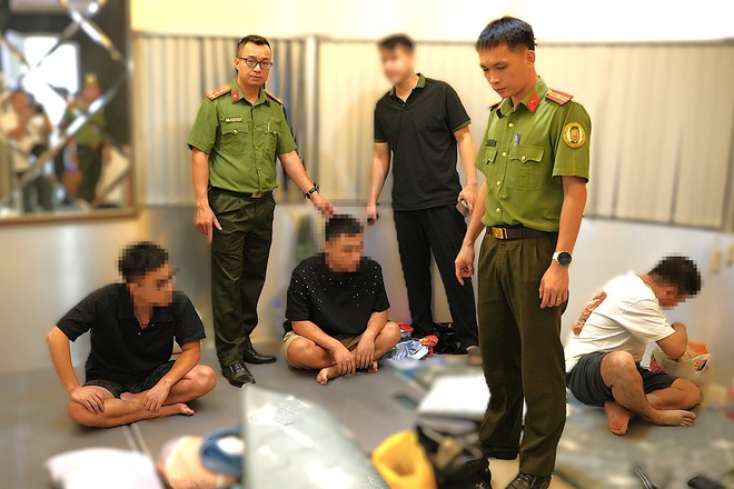 Vietnamese woman charged with organizing illegal stays for foreigners in southern Vietnam - Ảnh 3.