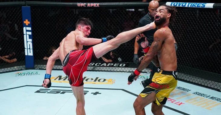 Võ sĩ gốc Việt đấm sưng mặt đối thủ, lập kỉ lục tại UFC - Ảnh 3.