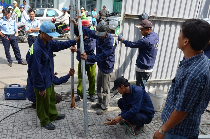 Ông Đoàn Ngọc Hải chỉ đạo cưỡng chế nhà tại chung cư Cô Giang - Ảnh 1.