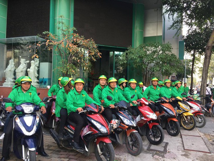 Mai Linh ra xe ôm cạnh tranh với Uber và Grab - Ảnh 1.