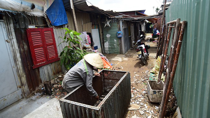 Đề xuất hỗ trợ người bị giải tỏa nhà xây theo giấy phép tạm - Ảnh 1.