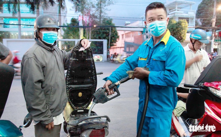 Ăn nên làm ra nhưng lo lạm phát - Ảnh 1.