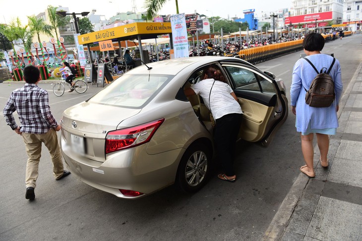 Siết chặt Uber, Grab… - Ảnh 1.