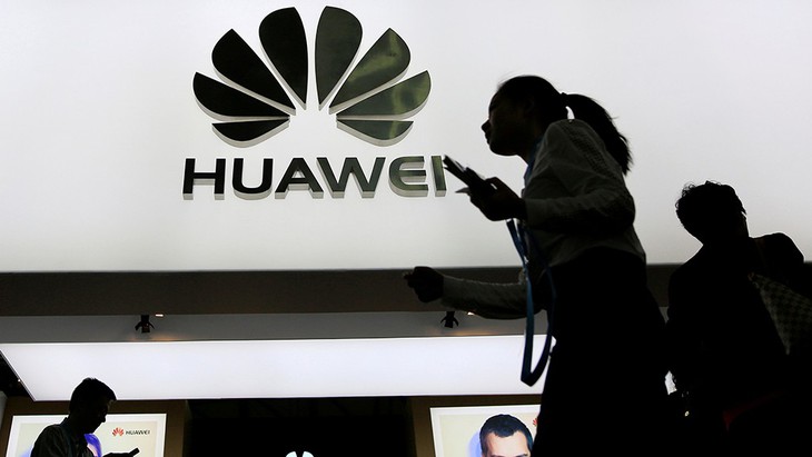 Huawei trong ván cờ của ông Trump - Ảnh 1.